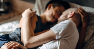 A couple holding each other and cuddling